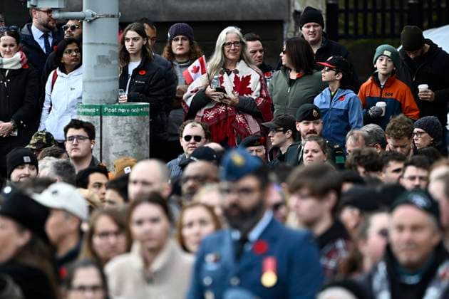 November 11, 2024, Ottawa, On, CAN: People line Elgin Street before a Remembrance Day ceremony at the National War Memorial in Ottawa on Monday, Nov. 11, 2024. Ottawa CAN  - ZUMAc35_ 20241111_zaf_c35_013 Copyright: xJustinxTangx