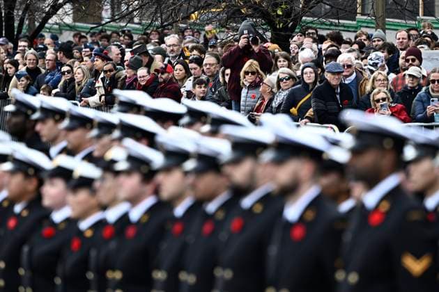 November 11, 2024, Ottawa, On, CAN: People look on as Canadian Armed Forces members march to a Remembrance Day ceremony at the National War Memorial in Ottawa on Monday, Nov. 11, 2024. Ottawa CAN  - ZUMAc35_ 20241111_zaf_c35_015 Copyright: xJustinxTangx