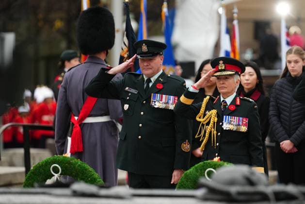 November 11, 2024, Ottawa, On, CAN: Chief of Defence Staff Jennie Carignan (right) and Chief Warrant Officer Bob McCann salute after placing wreaths at a Remembrance Day ceremony at the National War Memorial in Ottawa on Monday, Nov. 11, 2024. Ottawa CAN  - ZUMAc35_ 20241111_zaf_c35_025 Copyright: xSeanxKilpatrickx