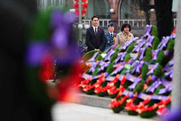 November 11, 2024, Ottawa, On, CAN: Prime Minister Justin Trudeau and Veterans Affairs Minister Ginette Petitpas Taylor (right) attend a Remembrance Day ceremony at the National War Memorial in Ottawa on Monday, Nov. 11, 2024. Ottawa CAN  - ZUMAc35_ 20241111_zaf_c35_032 Copyright: xSeanxKilpatrickx