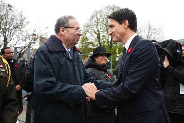 November 11, 2024, Ottawa, On, CAN: Prime Minister Justin Trudeau greets US ambassador to Canada David Cohen at a Remembrance Day ceremony at the National War Memorial in Ottawa on Monday, Nov. 11, 2024. Ottawa CAN  - ZUMAc35_ 20241111_zaf_c35_035 Copyright: xSeanxKilpatrickx