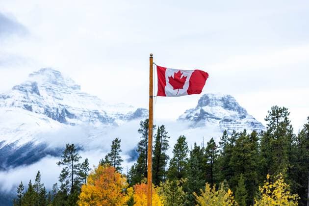 Flag of the country Canada on 09 10 2024 in Jasper The national flag of Canada was first hoisted on February 15, 1965 The national flag is described as a red maple leaf on a silver Canadian pole, with red on top xMSx