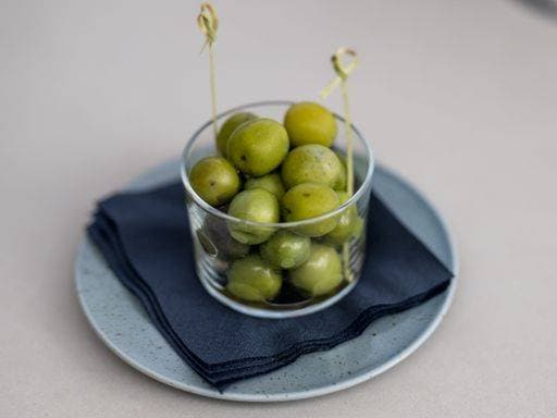 A plate filled with fresh green and black olives 27060142 RECORD DATE NOT STATED