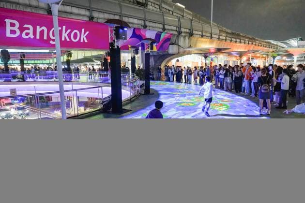 November 15, 2024, Bangkok, Thailand: Children run on the eco-friendly digital krathongs, or floating baskets, on a projection map river by the Bangkok Metropolitan Authority (BMA) at Pathumwan Skywalk during the festival. The Digital Loy Krathong Festival showcases digital krathong floating through projection mapping at Bangkok city shopping center. Bangkok Thailand - ZUMAs197 20241115_aaa_s197_172 Copyright: xSeksanxRochanametakulx
