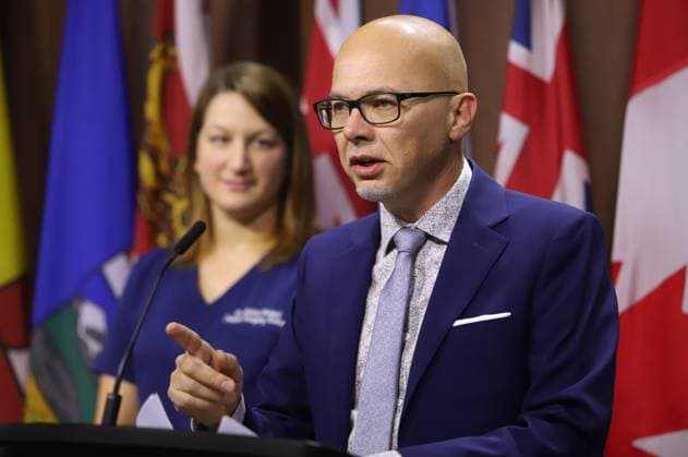 November 19, 2024, Ottawa, On, Canada: National director of policy and advocacy for the Canadian Health Coalition Steven Staples speaks at a press conference on Parliament Hill as chair of Canadian Doctors for Medicare Dr. Melanie Bechard looks on in Ottawa on Tuesday, Nov. 19, 2024. Ottawa Canada  - ZUMAc35_ 20241119_zaf_c35_033 Copyright: xPatrickxDoylex