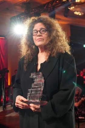 November 18, 2024, Toronto, Ontario, Canada: ANNE MICHAELS, 66, accepts the Giller Prize of $100,000 for her book Held a multigenerational look at war and trauma spanning more than a century. The jury cited the novel as an impactful and hypnotic exploration of mortality, resilience and desires, at ceremony in Toronto, Monday. Award boycotted by several prominent Canadian authors over its sponsors’ ties to Israel. Based in Toronto, Michaels a poet and author. In her acceptance speech, said that her writing is a way of bearing witness against war, indifference, against amnesia of every sort. Toronto Canada - ZUMAc35_ 20241118_zaf_c35_176 Copyright: xChrisxYoungx