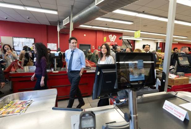 November 25, 2024, Montreal, Pq, CANADA: Prime Minister Justin Trudeau walks through the check out aisle as he tours Supermarche PA du Parc in Montreal on Monday, Nov. 25, 2024. Montreal CANADA  - ZUMAc35_ 20241125_zaf_c35_063 Copyright: xChristinnexMuschix