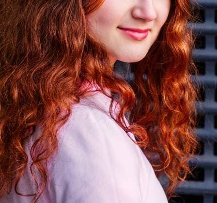 Creative Highlights Symbolbilder The lower part of the face of a cute girl with long red hair. The lower part of the face of a cute girl with long red hair looking back ,model released, Symbolfoto Copyright: xZoonar.com DIMITRIYxSHABANOVx 15358724 ,model released, Symbolfoto ,property released