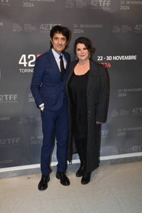 Turin: Turin: 42nd Turin Film Festival. Cinema Massimo. Red Carpet for the award La stella della Mole to Julia Ormond. In the photo: Giulio Base, Julia Ormond Turin  - ZUMAp169 20241127_zea_p169_534 Copyright: xMaurizioxD Avanzox