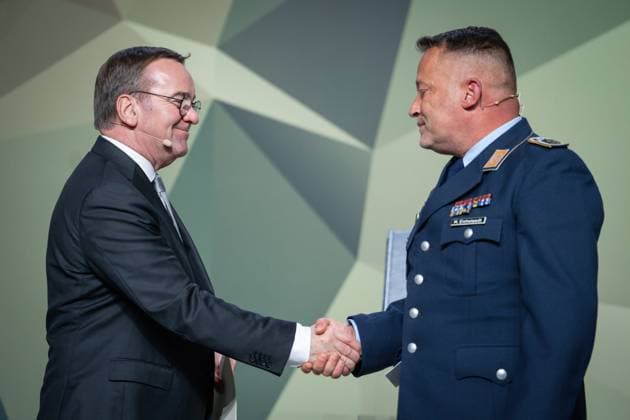 Presentation of the Bundeswehr and Society Award Boris Pistorius Federal Minister of Defense presents the Bundeswehr Award to Staff Sergeant Michael Eichstaedt, Forest of Remembrance at the presentation of the Bundeswehr and Society Award in the Paul Loebe Haus in Berlin Berlin Berlin Germany
