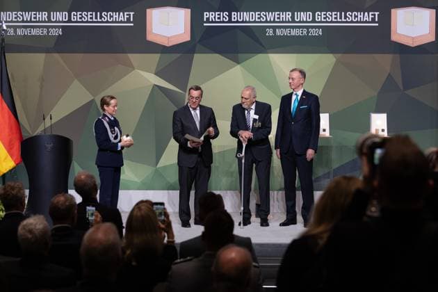 28 11 2024, Bundeswehr and Society Prize Award ceremony 2024 at the Paul Löbe Haus of the German Bundestag in Berlin In the category Associations, Klaus Kunzmann, Managing Partner, Patenschaftsgesellschaft Marineschiff Karlsruhe receives certificate and prize from the hands of the Minister of Defense, Dr Gerd Landsberg, Ho