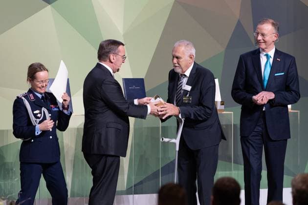 28 11 2024, Bundeswehr and Society Prize Award ceremony 2024 at the Paul Löbe Haus of the German Bundestag in Berlin In the category Associations, Klaus Kunzmann, Managing Partner, Patenschaftsgesellschaft Marineschiff Karlsruhe receives certificate and prize from the hands of the Minister of Defense, Dr Gerd Landsberg, Ho