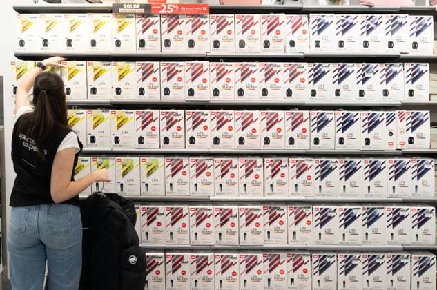 November 29, 2024, Montreal, Pq, CANADA: A Sport Expert s employee arranges stock during Black Friday in Montreal on Friday, Nov. 29, 2024. Montreal CANADA  - ZUMAc35_ 20241129_zaf_c35_022 Copyright: xChristinnexMuschix
