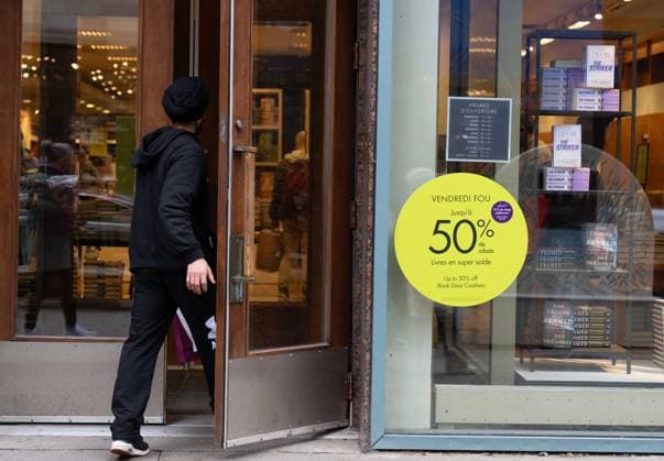November 29, 2024, Montreal, Pq, CANADA: Signs on storefronts advertise deals for shoppers on Black Friday in Montreal on Friday, Nov. 29, 2024. Montreal CANADA  - ZUMAc35_ 20241129_zaf_c35_025 Copyright: xChristinnexMuschix
