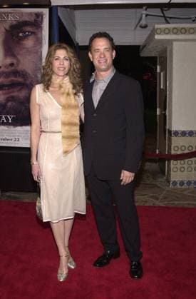 RECORD DATE NOT STATED Rita Wilson and Tom Hanks at the premiere of 20th Century Fox s Cast Away in Westwood, 12-07-00 , 10542830.jpg, couple, scarf, longhair, shorthair, blonde, brunette, yellow, suit, pumps, full,
