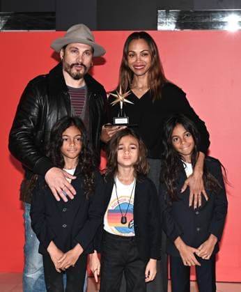 Turin, Italy Zoe Saldana receives the Stella della Mole Award at the National Museum of Cinema In the photo:Zoe Saldana Stella della Mole Award, Marco Perego husband and children  Copyright: xNickxZonnax xipa-agency.netx xNickxZonnax IPA_Agency_IPA52044586
