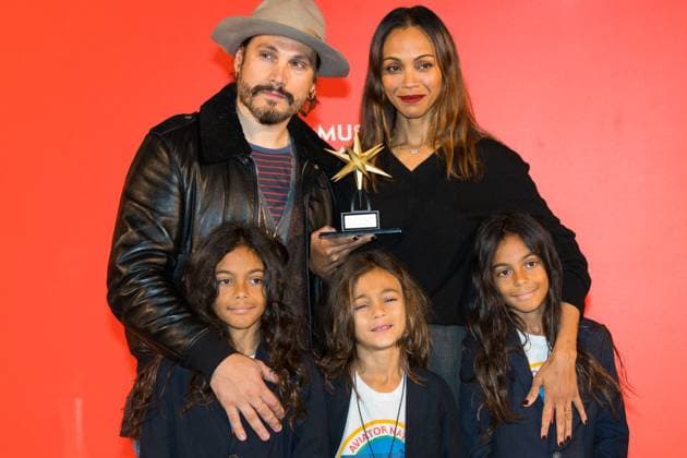 Zoe Saldana awarded at Italian National Museum of Cinema in Turin (Italy) Turin, Italy. 3rd December 2024. Actress Zoe Saldana with husband film director Marco Perego and their sons in Turin (Italy) where she received the Stella della Mole award at Italian National Museum of Cinema -  Copyright: xIPA ABACAx