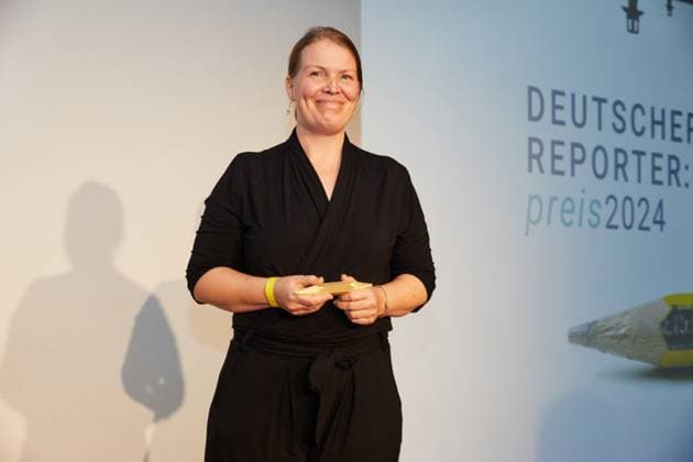 Reporterinnen Preis 2024 Award ceremony in the disused Cank department store in Berlin Neukölln Pictured is the winner of the science reportage category, Diana Laarz Name of the report What does normal mean?