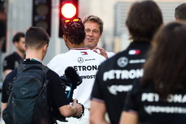 December 5, 2024, Abu Dhabi, United Arab Emirates: Brad Pitt, actor playing Sonny Hayes, a driver of the fictional Apex APXGP F1 team in the upcoming F1 movie directed by Joseph Kosinski, and Lewis Hamilton of Mercedes are seen on a movie set ahead of Formula 1 Abu Dhabi Grand Prix at Yas Marina Circuit on December 5th, 2024 in Abu Dhabi, United Arab Emirates. Abu Dhabi United Arab Emirates - ZUMAz156 20241205_zip_z156_026 Copyright: xBeataxZawrzelx