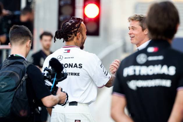 December 5, 2024, Abu Dhabi, United Arab Emirates: Brad Pitt, actor playing Sonny Hayes, a driver of the fictional Apex APXGP F1 team in the upcoming F1 movie directed by Joseph Kosinski, and Lewis Hamilton of Mercedes are seen on a movie set ahead of Formula 1 Abu Dhabi Grand Prix at Yas Marina Circuit on December 5th, 2024 in Abu Dhabi, United Arab Emirates. Abu Dhabi United Arab Emirates - ZUMAz156 20241205_zip_z156_030 Copyright: xBeataxZawrzelx