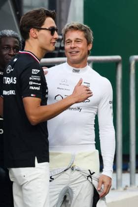 December 5, 2024, Abu Dhabi, United Arab Emirates: Brad Pitt, actor playing Sonny Hayes, a driver of the fictional Apex APXGP F1 team in the upcoming F1 movie directed by Joseph Kosinski, and George Russell of Mercedes are seen on a movie set ahead of Formula 1 Abu Dhabi Grand Prix at Yas Marina Circuit on December 5th, 2024 in Abu Dhabi, United Arab Emirates. Abu Dhabi United Arab Emirates - ZUMAz156 20241205_zip_z156_042 Copyright: xBeataxZawrzelx