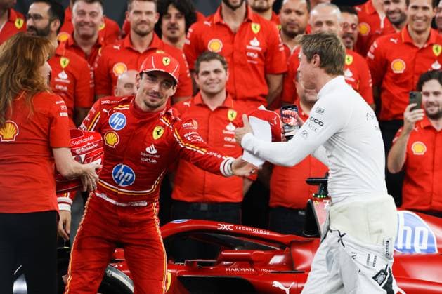 December 5, 2024, Abu Dhabi, United Arab Emirates: Charles Leclerc of Ferrari and Brad Pitt, actor playing Sonny Hayes, a driver of the fictional Apex APXGP F1 team in the upcoming F1 movie directed by Joseph Kosinski, are seen ahead of Formula 1 Abu Dhabi Grand Prix at Yas Marina Circuit on December 5th, 2024 in Abu Dhabi, United Arab Emirates. Abu Dhabi United Arab Emirates - ZUMAz156 20241205_zip_z156_046 Copyright: xBeataxZawrzelx