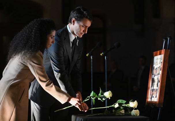 December 6, 2024, Montreal, Pq, Canada: Prime Minister Justin Trudeau and MP Rachel Bendayan place white roses on a table during a ceremony to honour the victims of the 1989 Polytechnique massacre in Montreal, Friday, December 6, 2024. Today marks the 35th anniversary of the shooting rampage that left 14 women dead. Montreal Canada  - ZUMAc35_ 20241206_zaf_c35_078 Copyright: xGrahamxHughesx