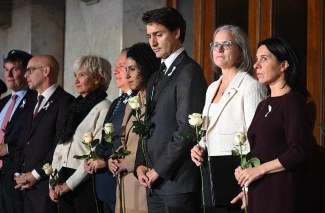 December 6, 2024, Montreal, Pq, Canada: Prime Minister Justin Trudeau, centre, attends a ceremony to honour the victims of the 1989 Polytechnique massacre in Montreal, Friday, December 6, 2024. Today marks the 35th anniversary of the shooting rampage that left 14 women dead. Montreal Canada  - ZUMAc35_ 20241206_zaf_c35_086 Copyright: xGrahamxHughesx