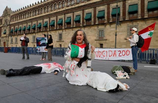 Palestinian Activists And Supporters Demonstrate Against The Genocide In Gaza At The Zocalo In Mexico City Palestinian activists and supporters demonstrate against the genocide in Gaza in the Zocalo of Mexico City, Mexico, on December 6, 2024, to demand an end to the bombings that the Israeli army carries out for a year in the Palestinian territories in the Gaza Strip after the attack by the Hamas group, where more than 40,000 people die and a large number of people are injured, which is considered an act of crimes against humanity, genocide, and ethnic extinction. Mexico City Mexico City Mexico  Copyright: xGerardoxVieyrax originalFilename: vieyra-notitle241206_npkgr.jpg