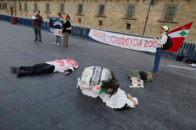 Palestinian Activists And Supporters Demonstrate Against The Genocide In Gaza At The Zocalo In Mexico City Palestinian activists and supporters demonstrate against the genocide in Gaza in the Zocalo of Mexico City, Mexico, on December 6, 2024, to demand an end to the bombings that the Israeli army carries out for a year in the Palestinian territories in the Gaza Strip after the attack by the Hamas group, where more than 40,000 people die and a large number of people are injured, which is considered an act of crimes against humanity, genocide, and ethnic extinction. Mexico City Mexico City Mexico  Copyright: xGerardoxVieyrax originalFilename: vieyra-notitle241206_npqCT.jpg