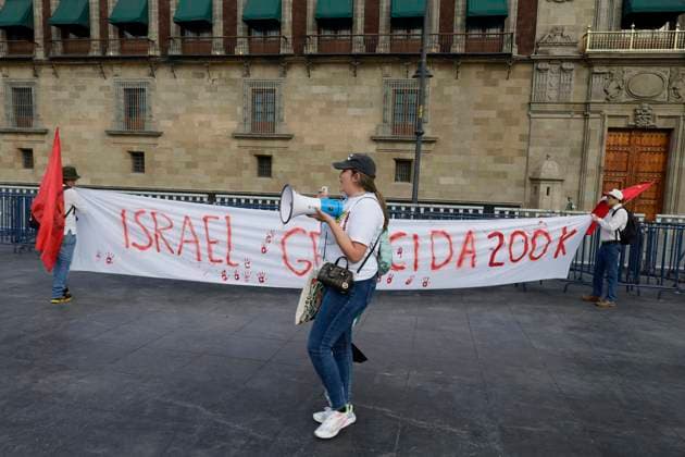 Palestinian Activists And Supporters Demonstrate Against The Genocide In Gaza At The Zocalo In Mexico City Palestinian activists and supporters demonstrate against the genocide in Gaza in the Zocalo of Mexico City, Mexico, on December 6, 2024, to demand an end to the bombings that the Israeli army carries out for a year in the Palestinian territories in the Gaza Strip after the attack by the Hamas group, where more than 40,000 people die and a large number of people are injured, which is considered an act of crimes against humanity, genocide, and ethnic extinction. Mexico City Mexico City Mexico  Copyright: xGerardoxVieyrax originalFilename: vieyra-notitle241206_npyRv.jpg