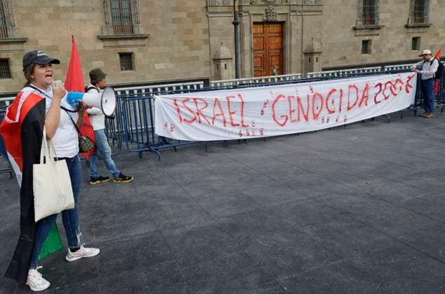 Palestinian Activists And Supporters Demonstrate Against The Genocide In Gaza At The Zocalo In Mexico City Palestinian activists and supporters demonstrate against the genocide in Gaza in the Zocalo of Mexico City, Mexico, on December 6, 2024, to demand an end to the bombings that the Israeli army carries out for a year in the Palestinian territories in the Gaza Strip after the attack by the Hamas group, where more than 40,000 people die and a large number of people are injured, which is considered an act of crimes against humanity, genocide, and ethnic extinction. Mexico City Mexico City Mexico  Copyright: xGerardoxVieyrax originalFilename: vieyra-notitle241206_npVsR.jpg