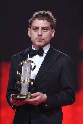 Marrakech Closing Ceremony Director Damian Kocur poses with the award for Under the Volcano during the Closing Ceremony during the 21st Marrakech International Film Festival in Marrakech, Morocco on December 07, 2024. Photo by Aurore Marechal ABACAPRESS.COM Marrakech Morocco  Copyright: xMarechalxAurore ABACAx