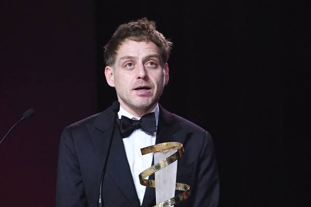 Marrakech Closing Ceremony Director Damian Kocur poses with the award for Under the Volcano during the Closing Ceremony during the 21st Marrakech International Film Festival in Marrakech, Morocco on December 07, 2024. Photo by Aurore Marechal ABACAPRESS.COM Marrakech Morocco  Copyright: xMarechalxAurore ABACAx