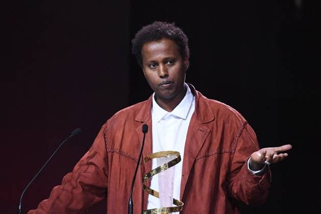 Marrakech Closing Ceremony Director Mo Harawe receives the award for The village next to Paradise attending the Closing Ceremony during the 21st Marrakech International Film Festival in Marrakech, Morocco on December 07, 2024. Photo by Aurore Marechal ABACAPRESS.COM Marrakech Morocco  Copyright: xMarechalxAurore ABACAx
