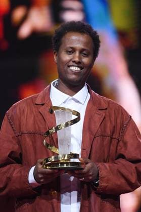 Marrakech Closing Ceremony Director Mo Harawe receives the award for The village next to Paradise attending the Closing Ceremony during the 21st Marrakech International Film Festival in Marrakech, Morocco on December 07, 2024. Photo by Aurore Marechal ABACAPRESS.COM Marrakech Morocco  Copyright: xMarechalxAurore ABACAx