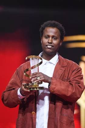 Marrakech Closing Ceremony Director Mo Harawe receives the award for The village next to Paradise attending the Closing Ceremony during the 21st Marrakech International Film Festival in Marrakech, Morocco on December 07, 2024. Photo by Aurore Marechal ABACAPRESS.COM Marrakech Morocco  Copyright: xMarechalxAurore ABACAx