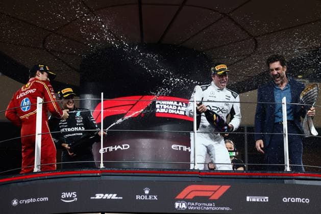 December 8, 2024, Abu Dhabi, United Arab Emirates: Charles Leclerc of Ferrari, George Russell of Mercedes, actor Javier Bardem and Brad Pitt, actor playing Sonny Hayes, a driver of the fictional Apex APXGP F1 team in the upcoming F1 movie by Joseph Kosinski are filming a scene during Formula 1 Abu Dhabi Grand Prix at Yas Marina Circuit. Abu Dhabi United Arab Emirates - ZUMAz156 20241208_zip_z156_125 Copyright: xBeataxZawrzelx