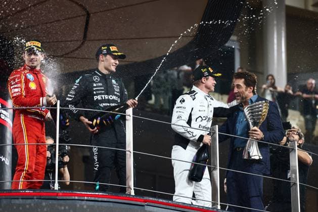 December 8, 2024, Abu Dhabi, United Arab Emirates: Charles Leclerc of Ferrari, George Russell of Mercedes, actor Javier Bardem and Brad Pitt, actor playing Sonny Hayes, a driver of the fictional Apex APXGP F1 team in the upcoming F1 movie by Joseph Kosinski are filming a scene during Formula 1 Abu Dhabi Grand Prix at Yas Marina Circuit. Abu Dhabi United Arab Emirates - ZUMAz156 20241208_zip_z156_134 Copyright: xBeataxZawrzelx