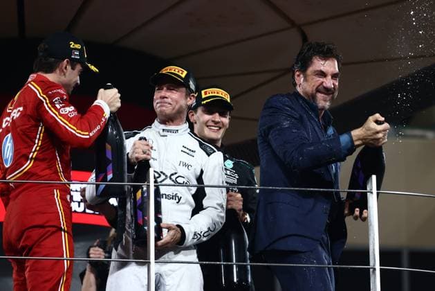 December 8, 2024, Abu Dhabi, United Arab Emirates: Charles Leclerc of Ferrari, George Russell of Mercedes, actor Javier Bardem and Brad Pitt, actor playing Sonny Hayes, a driver of the fictional Apex APXGP F1 team in the upcoming F1 movie by Joseph Kosinski are filming a scene during Formula 1 Abu Dhabi Grand Prix at Yas Marina Circuit. Abu Dhabi United Arab Emirates - ZUMAz156 20241208_zip_z156_142 Copyright: xBeataxZawrzelx