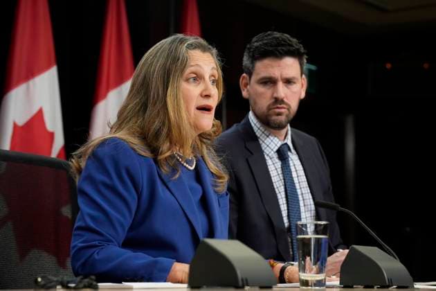December 10, 2024, Ottawa, On, Canada: Minister of Housing, Infrastructure and Communities Sean Fraser listens to Depury Prime Minister and Finance Minister Chrystia Freeland speak during a news conference, Tuesday, Dec. 10, 2024. Ottawa Canada  - ZUMAc35_ 20241210_zaf_c35_001 Copyright: xAdrianxWyldx