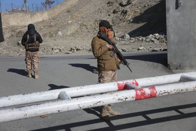 News Themen der Woche KW50 News Bilder des Tages (241212) -- KABUL, Dec. 12, 2024 -- Security force members are seen outside the gate of the ministry for refugees and repatriation of the Afghan caretaker government in Kabul, Afghanistan, Dec. 12, 2024. The extremist militant group Islamic State (IS) has claimed responsibility for a suicide bombing that killed Afghanistan s acting minister for refugees and repatriation on Wednesday. IS militant detonated his explosive vest, resulting in the deaths of Khalil Rahman Haqqani and several of his colleagues and bodyguards, a report issued by IS-affiliated news agency Amaq stated. (Photo by Xinhua) AFGHANISTAN-KABUL-SUICIDE ATTACK-AFTERMATH SaifurahmanxSafi 