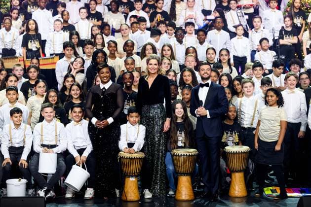 Leusden, The Netherlands, 2024-12-12 13:14:22 LEUSDEN, 12-12-2024, AFAS Theater Recordings of the Christmas Music Gala 2024. Young musical creatives join forces with famous artists. Special guest is the honorary chair of the More Music in the Classroom foundation: Queen Maxima. PHOTO: NLBeeld Patrick van Emst. In the photo: Queen Maxima with Buddy Vedder and Edsilia Rombley. Credit: NL Beeld Patrick van Emst  Copyright: xx x