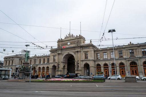 A view of the Zurich Hauptbahnhof, a historic train station in Switzerland, with classical architecture and bustling activity. 27685777 RECORD DATE NOT STATED