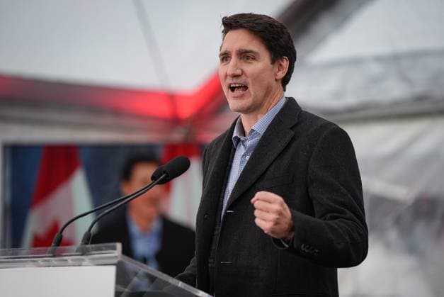 December 13, 2024, North Vancouver, Bc, CANADA: Prime Minister Justin Trudeau speaks during a launch and naming ceremony for the new Royal Canadian Navy Joint Support vessel HMCS Protecteur, at Seaspan Shipyards in North Vancouver, B.C., on Friday, December 13, 2024. North Vancouver CANADA  - ZUMAc35_ 20241213_zaf_c35_099 Copyright: xDarrylxDyckx