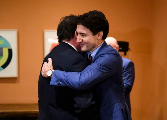 December 16, 2024, Ottawa, On, CAN: Prime Minister Justin Trudeau embraces Dominic LeBlanc after he was sworn in as Minister of Finance in a ceremony at Rideau Hall in Ottawa, on Monday, Dec. 16, 2024. Ottawa CAN  - ZUMAc35_ 20241216_zaf_c35_161 Copyright: xJustinxTangx