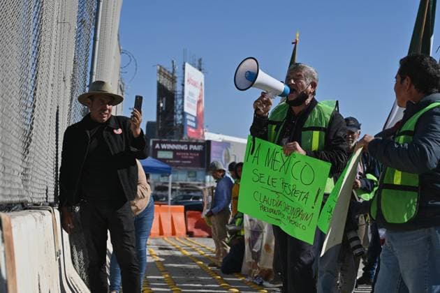 December 18, 2024, Tijuana, Baja California, Mexico: Angels Without Borders activists Hugo Castro, Sergio Tamai and the Joventud 2000 migrant shelter director Jose Ã¢â‚¬oeChemaÃ¢â‚¬Â Maria Garcia demand respect for Mexico and its people during a demonstration on the need for migrants rights, the arrival of President-elect Donald Trump as U.S. president and no to mass deportation policies during a march and protest to the San Ysidro Port of Entry International U.S.-Mexico border with migrants during International Migrants Day in Tijuana, Mexico on Wednesday, December 18, 2024. Tijuana Mexico - ZUMAm180 20241218_zip_m180_004 Copyright: xCarlosxA.xMorenox