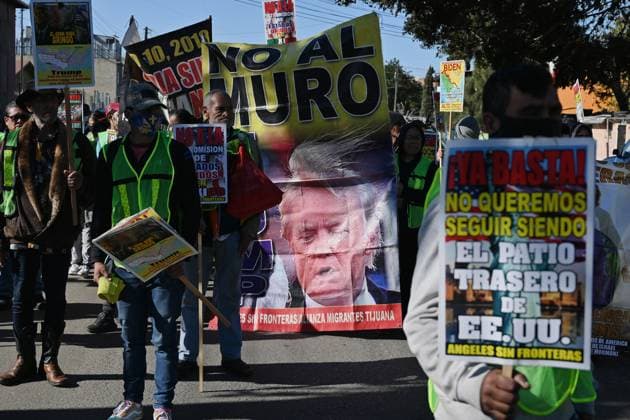 December 18, 2024, Tijuana, Baja California, Mexico: Mexican migrants who have been deported from the United States to Mexico, families seeking asylum and activists demonstrate on the need for migrants rights, the arrival of President-elect Donald Trump as U.S. president and no to mass deportation policies during a march and protest to the San Ysidro Port of Entry International U.S.-Mexico border during International Migrants Day in Tijuana, Mexico on Wednesday, December 18, 2024. Tijuana Mexico - ZUMAm180 20241218_zip_m180_014 Copyright: xCarlosxA.xMorenox