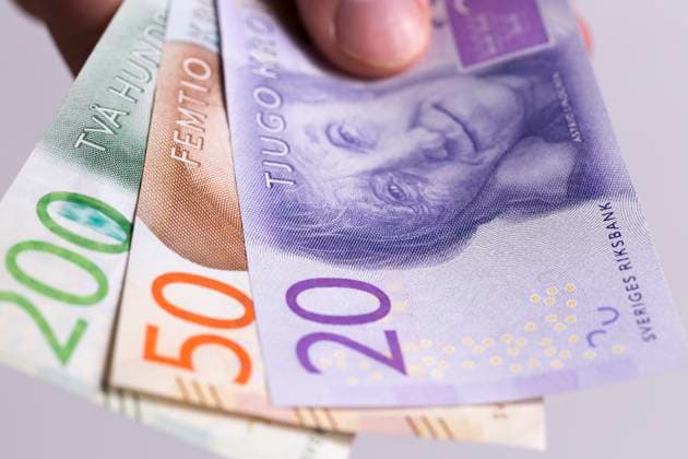 Swedish Currency New 20, 50, 200 note close up. Helt in hand. Introduced in 2015. , 20378836.jpg, 20, 200, 2015, 50, Currency, Evert Taube, astrid lindgren, close up, crowns, finger, hand, held, holding, ingmar bergman, introduced, kr, kronor, macro, micro, money, new, note, notes, sweden, swedish, thumb, RECORD DATE NOT STATED