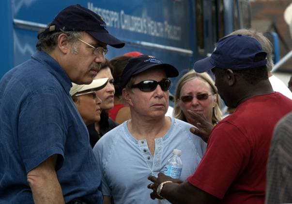 KRT US NEWS STORY SLUGGED: WEA-KATRINA KRT PHOTOGRAPH BY KARL MONDON CONTRA COSTA TIMES (September 5) BILOXI, MS -- SSinger Paul Simon (center) listens to the Rev. Edward Moses (left) during a visit to Biloxi, Mississippi, on September 5, 2005, to help open Operation Assist, a two-unit mobile clinic outlet that will provide emergency services to children and families in the Hurricane Katrina disaster area. (cdm) 2005 BILOXI MS USA EDITORIAL USE ONLY Copyright: xx 1021295 KARLxMONDONx krtphotoslive184790